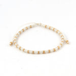 Charger l'image dans le visualiseur de galerie, Bracelet femme blanc opale, perle et or en perle Miyuki. Fil blanc. Fermoir coulissant ajustable