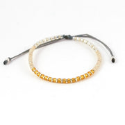 Bracelet topaze ombrée et argent, fil gris clair. Fermoir coulissant ajustable. Fabriqué à la main en France